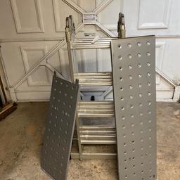 Multi position ladders with two platform boards. Collection only.