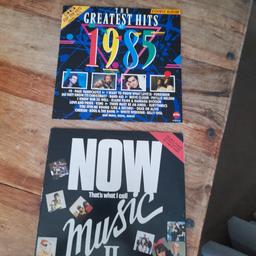 vinyl 1  Now thats what i call music 2 with hits  by queen ,,madness ,,thompson twins ,,the smiths ,,rolling stones  ect, vinyl 2 , greatest hits of 1985 with paul young ,strawberry switchblade,,billy idol, alison moyet ect , all in good condition