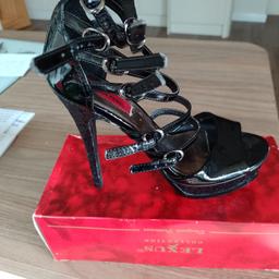 London Rebel high heeled buckle up shoes