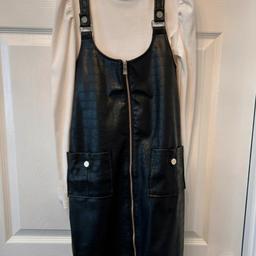 Girls 2 piece leatherette dress and long sleeve ribbed roll neck top.

Size: 12 years 
Colour: Black, white 

Condition: in very good #likenew condition. Worn 2-3 times and still looks great! No flaws or imperfections