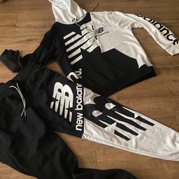 Black and white jogging style material tracksuit hooded top and matching bottoms never worn tags just removed smoke free home