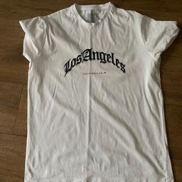 Round neck white T-shirt with black logo