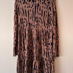 Older girls #riverisland long sleeve animal print dress 

Size: 11-12 years (generous in size, may fit up to age 14 years bcos my sister is a uk size 8 and it fits her). 
Colour: Black, brown 

Condition: in very good #likenew condition.  Worn 2-3 times and still looks great! No flaws or imperfections