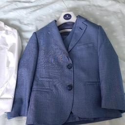 Boys age 5 Creon Previs blue suit with navy/feature lining. Comes with jacket, waistcoat and trousers, and matching Next white shirt and navy tie. Excellent condition as only worn once for a wedding. £30