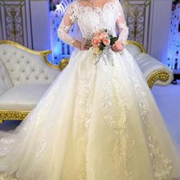 wedding dress size 10 long sleeve.I will sell it with the Veil and A Line Wedding Petticoat