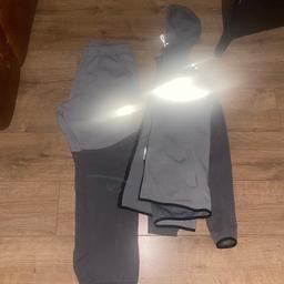 Grey and dark grey hooded top and matching bottoms smoke free home