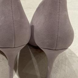 These size 6 high heels suede lilac new in the box bought for a wedding but didn’t match the dress collection but can post