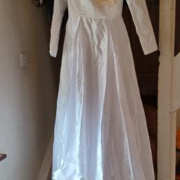 bought item for wedding but never used. states size 10 but I would say it was about 8. very long satin material but been in storage so may have odd mark which will come out.