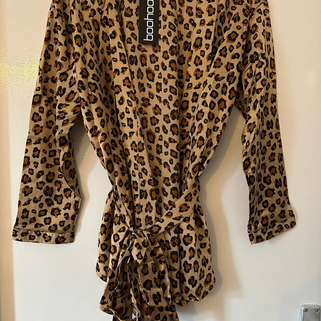 Brand new with tags ladies leopard print wrap top size 6.