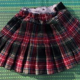 Girls red tartan skirt from next age 12-18 months. Adjustable waist. 

Can be posted out for extra costs.