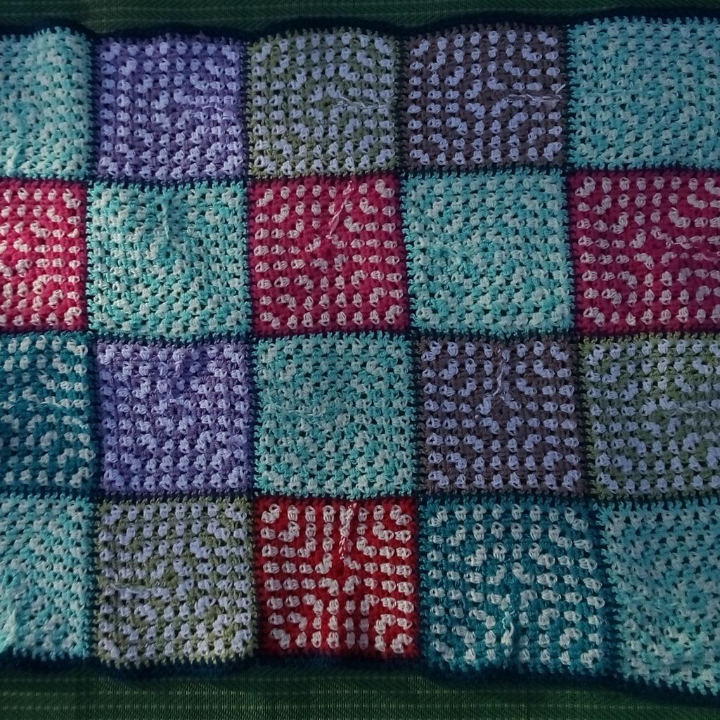 Lovely hand knitted throw would be great in a campervan, cot, lap, sofa throw or even decorative wall ornament etc

L100XW80cm.

Made by a neighbour so helping out to sell. Made of thick woolen yarn as can be seen in the photographs.

A variety of great colours, so brighten up these cold evenings.