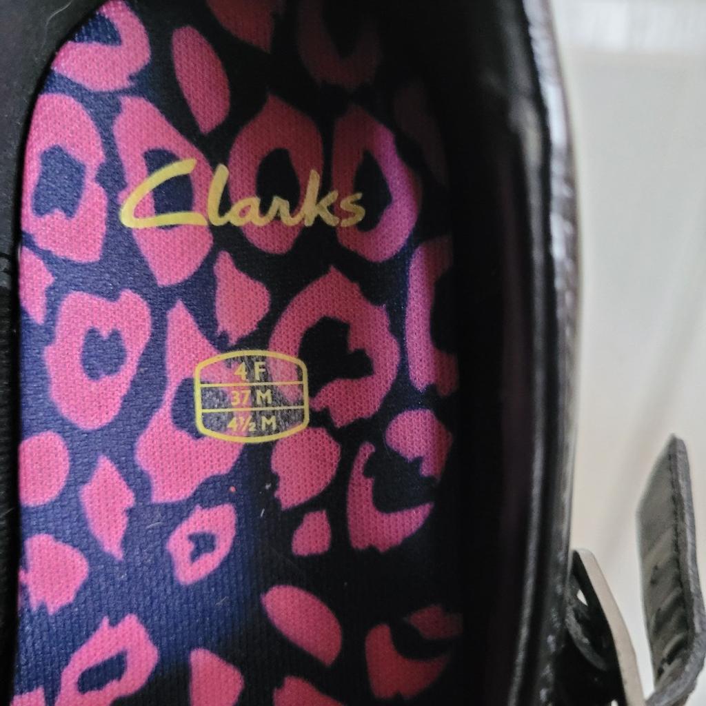 Clarks Bootleg black patent buckle flat
shoes