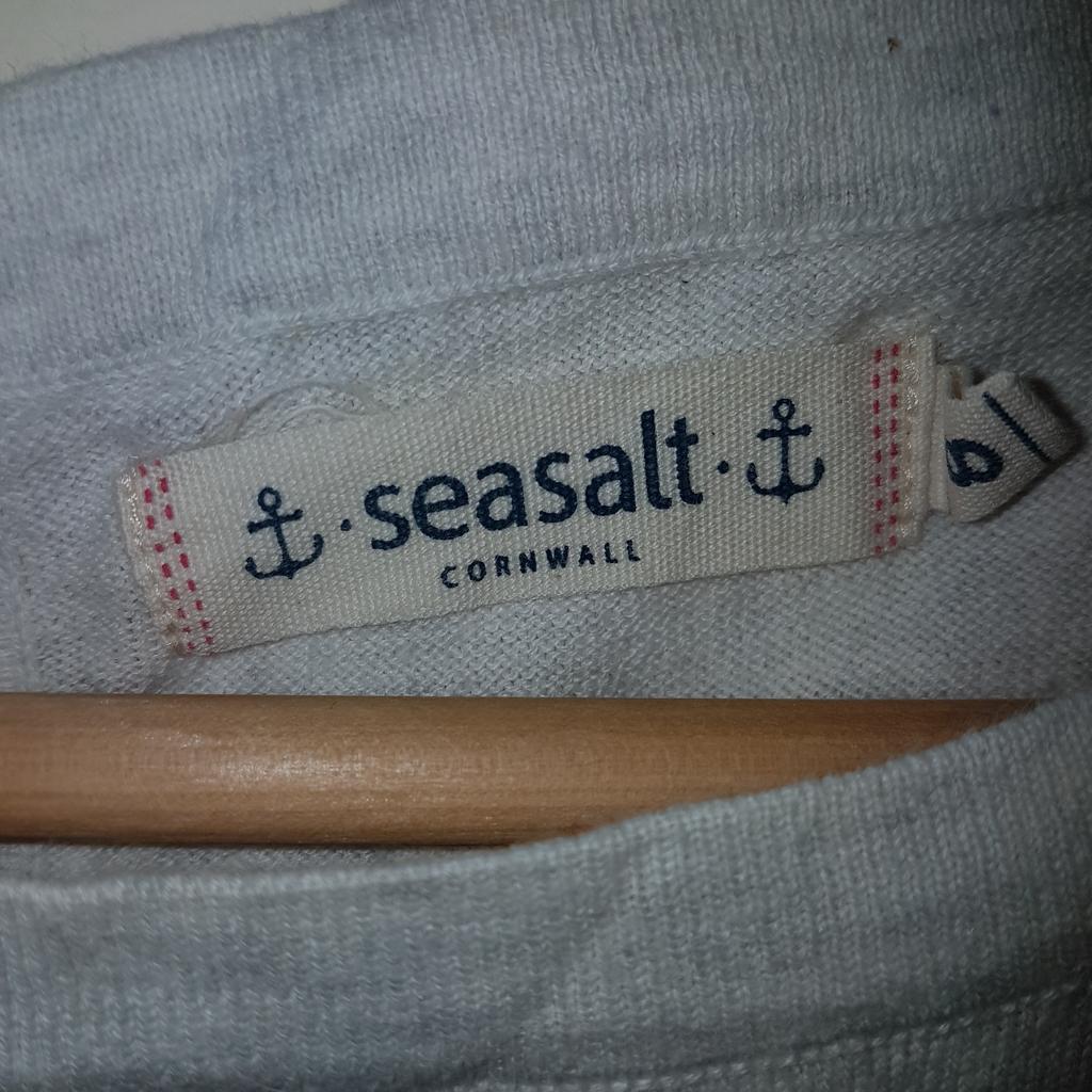 Seasalt quality, Seasalt style. If you know Seasalt you know what to expect. Marked up as an 8 but fits a medium perfectly. Soft, comfortable fabric. Lovely shape and style. Doesn't cling, hangs beautifully. Cute fabric button down the back. Nice loose sleeves, comfortable neck. Cool, not heavy.