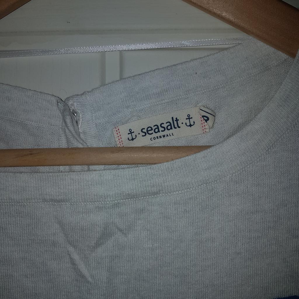 Seasalt quality, Seasalt style. If you know Seasalt you know what to expect. Marked up as an 8 but fits a medium perfectly. Soft, comfortable fabric. Lovely shape and style. Doesn't cling, hangs beautifully. Cute fabric button down the back. Nice loose sleeves, comfortable neck. Cool, not heavy.