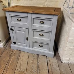 freshly refurbished sideboard,painted in a mid grey colour,with top sanded back to natural wood and finished with a dark wax and antique brass handles fitted,width 36 inches,depth 17 inches,height 33 inches.