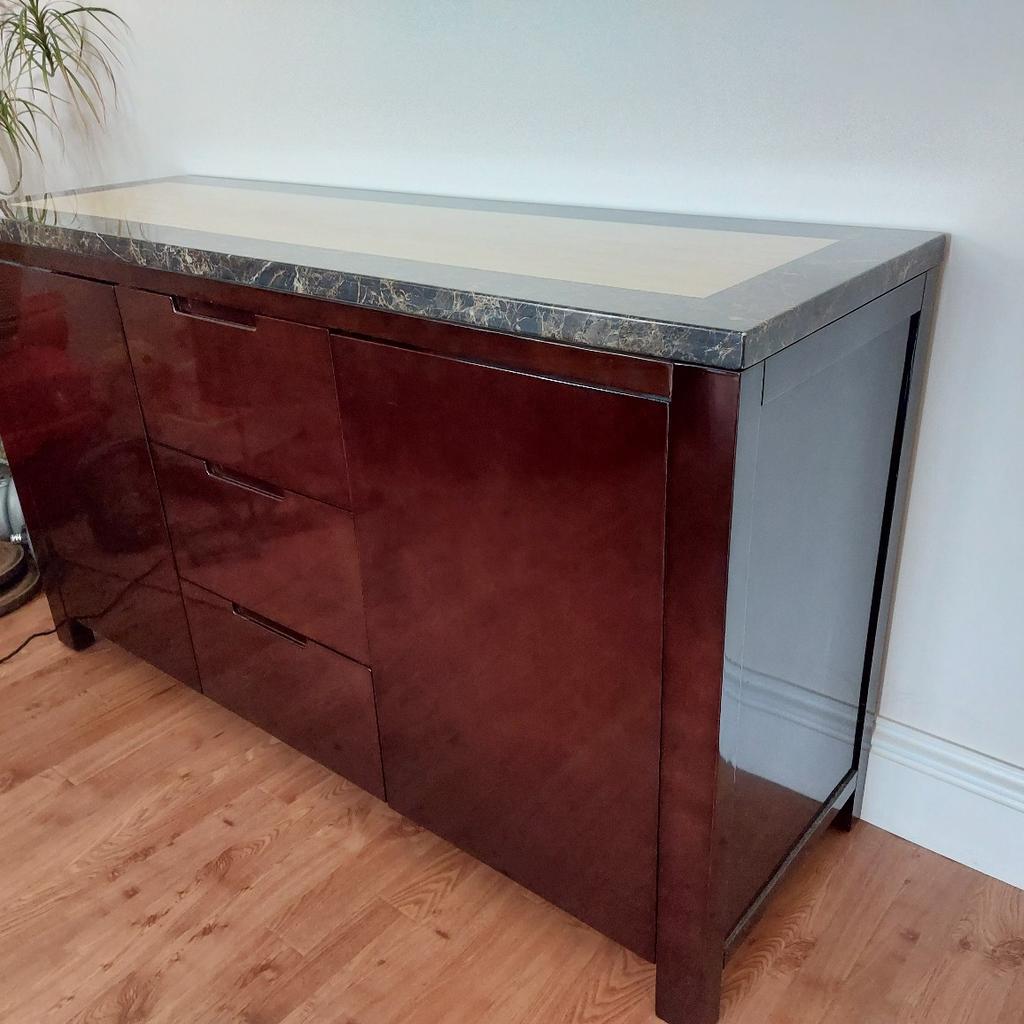 Marble top dark brown Side Unit. In good condition. Collect from Sutton
80cm Height
45cm Depth
140cm width