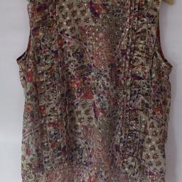 Miss Selfridge Top UK 14 
Bohemian pattern with golden highlights to sparkle.
Add some colour to these dreary cooler months, or can be used on holiday.

Local collection preferred or can be posted out for extra costs. UK mainland.

Huge clearout with plans to emigrate to warmer climes all year round.