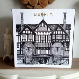 The Liberty London Beauty Advent Calendar  is a twenty-five-day advent calendar, with a chest design, which is the same as every other year. 

On the front of the ‘chest’ there’s an illustration of the iconic Liberty London store front, and the inside of the calendar is lined with a beautiful Liberty London print, adorning the inside of the doors, and the 25 numbered drawers.

Please note this empty & can easily be refilled with other items of your choosing.  A couple of marks whilst in storage