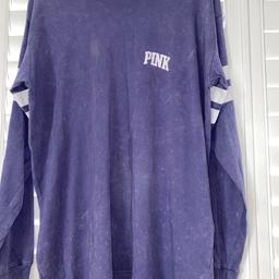 Pink long sleeved T shirt in purple. Thinner material than other two listed. 
Size large.
Worn couple of times only. 
I have lots of other items for sale - happy to combine postage.