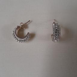 Silver cluster  hoop stud earrings.  Never been worn. Pet and smoke-free home.  Collection only.