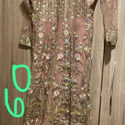 Desighner embroidery dress with bottoms Mohsin naveed ranjha worn for 4 hours in good condition size betwen large XL bought it expensive selling at reasonable price from pet and smoke free home please check my other items thanks.