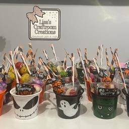 Hand painted Halloween pots filled with sweets. £1 per pot.