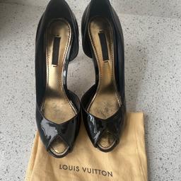LV pumps,in fair condition,size 38 ,in black patent colour,has some minor scratches on the heel,gold plaque slightly rusted.