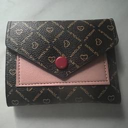 Brand new card holder, the pink part is a pocket so could a few coins 

Collection hopwood b48