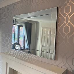 Large mirror in excellent condition no chips or marks.  

41 inches long 29inches wide