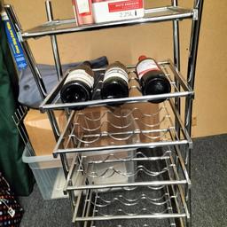 Chrome wine rack holds 15 bottles with glass shelf on top good condition 20pounds £16pounds