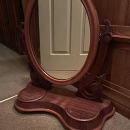 Vintage wooden dressing table mirror, with scroll detail, and two lift up lids for storing trinkets, jewellery etc. Heavy and sturdy. This is old, so is in used condition with some age related wear and marks, but no cracks to the mirror. This is reflected in the price. It measures approx 2 ft wide x approx 1ft 10 inches high. Collection only from Stourbridge. Delivery/postage not available.