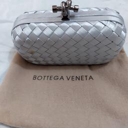 womens clutch bag silver colour has never been used but has a small stain on one section, as you can see in the picture