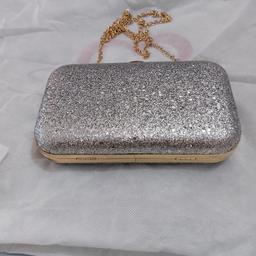 Beautifull silver colour fancy clutch for any occasion like new