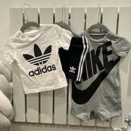 Baby boy Nike romper
And adidas shorts & top
Adidas top has small stain mark round neck
Possible to get rid of it with stain remover
(I haven’t tried) 
Size 6-9 months