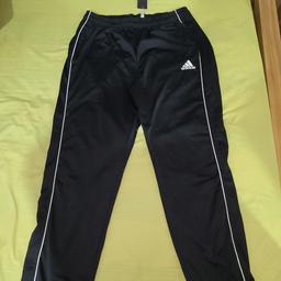 Adidas Tracksuit Bottoms in black and white 
Brand-New Size XL