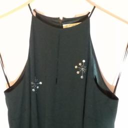 NEXT black dress Size UK12 / Eur 40.

Beaded Flowers Sleeveless Elegance for nights out & parties etc.

Fabric 100% polyester.

Length 105cm measured from top shoulder.

Bust  45cm measured on flat.

Waist 78cm.

Great condition.

Local collection preferred or can be posted out at extra costs.