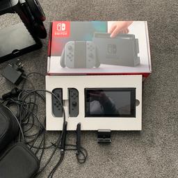 Re-listed due to time waster…. This is an original (2017) grey Nintendo Switch console in original box with all contents and additional extras, messenger bag with console case, in car charger, hdmi cable, tower where docking station fits to the top, steering wheels & controller adapters to the sides with drawer and games storage, stand and more, see pictures for all items included.

In used, working, condition, reset to factory settings.

Selling only as no longer played with by our boys.

No games included.

Pick up from OL9/North Chadderton area if Oldham.

SOLD AS SEEN. Buyer to be happy with bundle before leaving with it as no returns accepted.

Cash on collection only

Any silly offers will be ignored!

Any questions please ask 🙂