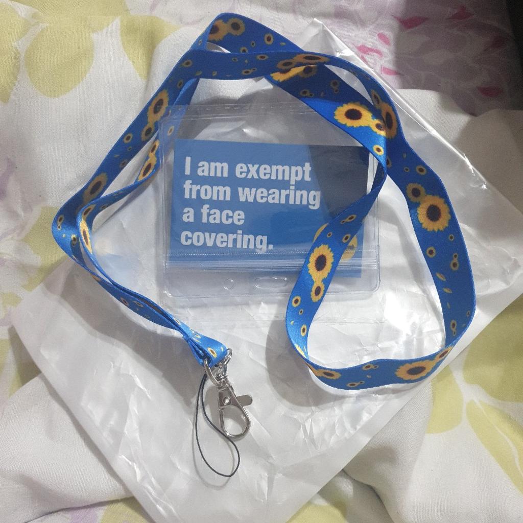 blue sunflower lanyard with exemption card
Brand new