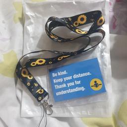 black sunflower lanyard with exemption card
Brand new