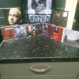 All brand new unused,

Eminem bag/rucksack
Eminem autobiography book (whatever you say I am... The life and times of Eminem)
50 cent book (from pieces to weight.... Once upon a time in southside queen's)
6 unopened still sealed in wrapping Eminem cd albums

.-Music to be murdered by
-Music to be murdered by side B deluxe edition
-The Eminem show
-Recovery
-ShadyXV
-The slim shady LP

Collection only as I don't drive sorry