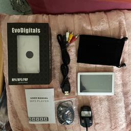 EvoDigitals MP4/MP5 player, with built in FM radio, built in speaker, and handy carry case.
Like new used once.