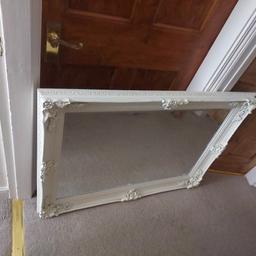 a lovely cream antique style mirror.