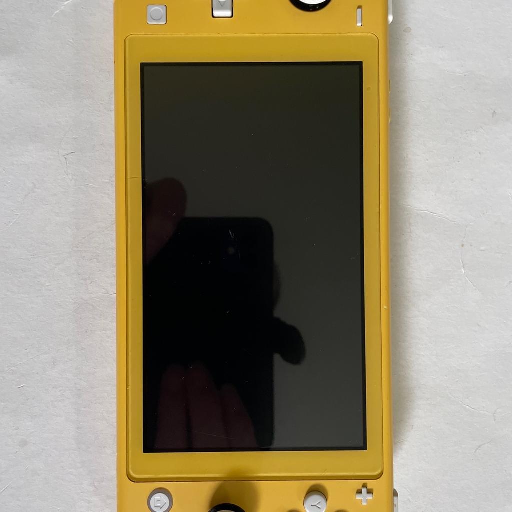 Yellow Nintendo Switch Lite Console in good condition just a few very light marks on screen not noticeable when console is being operated,comes with Four games consisting of unopened GhostBusters the video game remastered/Unopened Who Wants To Be A Millionaire/and Two films on one cartridge ie Aladdin and Lion King no booklet,also comes with replacement charger