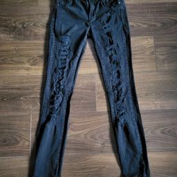 Black rock punk skinny jeans from Forever 21 in size W28