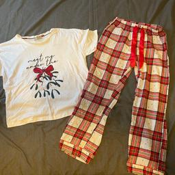 Christmas pyjamas. Size 10. Small mark on top as shown in pics