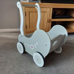 Baby walker (wooden) good condition (black paint worn on wheels due to use)
Collection only
