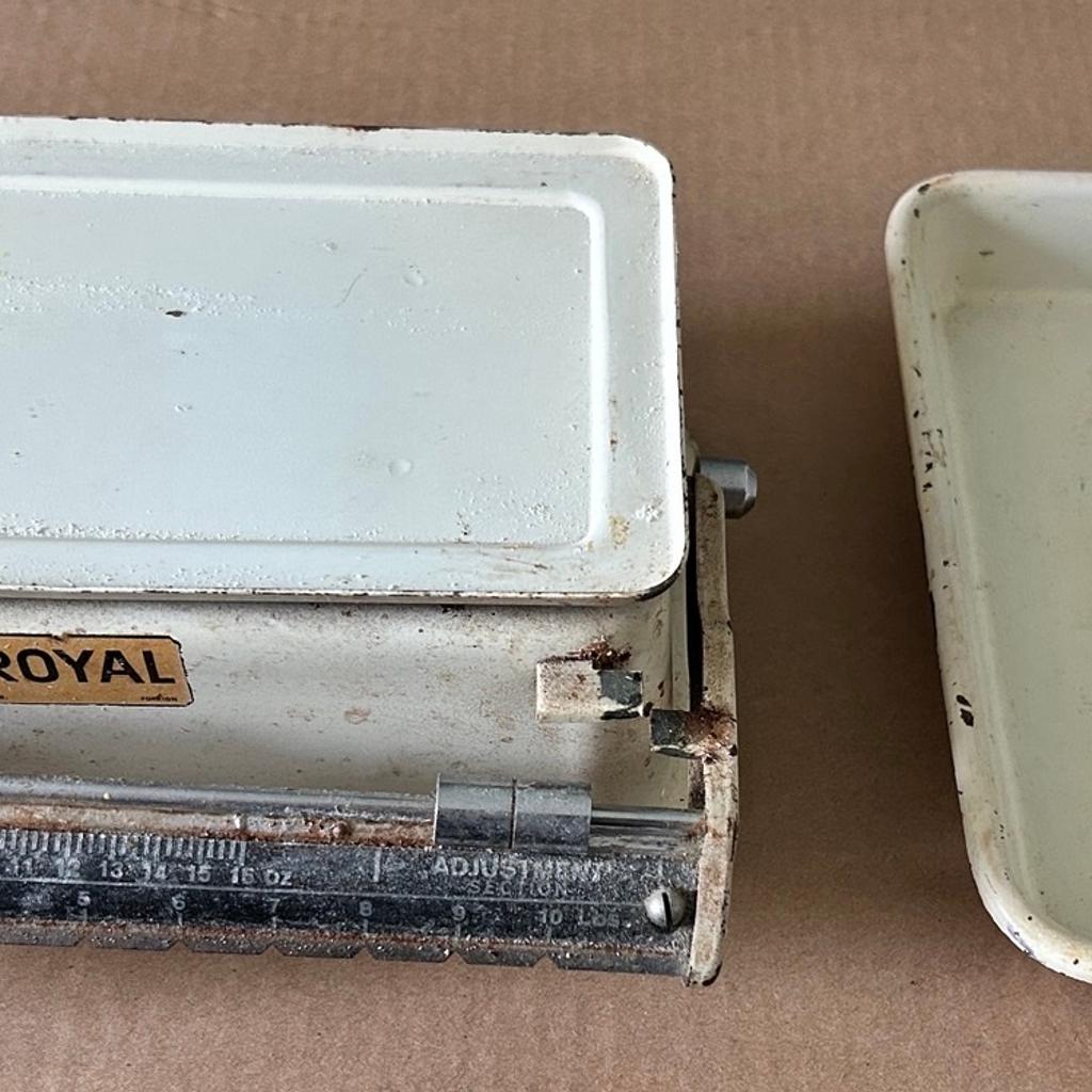 This vintage kitchen scale by Royal is made from enamel and metal, and it features a balance beam design and a white colour scheme. The set includes a base and is perfect for measuring ingredients.

Condition is fair for the age of the item, but I have not attempted to clean up as I do not want to damage originality of item, and prefer to leave that to experts should they wish to restore fully.

Any questions, please ask