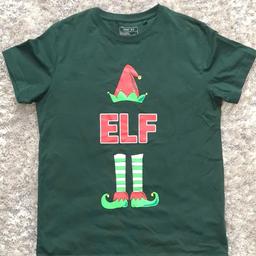 Christmas Elf T-shirt

Size/Age 11

Green in colour

Like New, only work once

