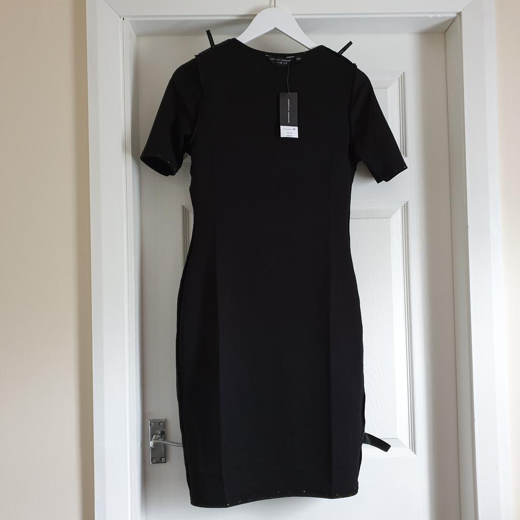 Dress " Dorothy Perkins "

 With Brilliance

 Black Colour

New With Tags

Actual size: cm and m

Length: 1.00 m

Length: 77 cm from armpit side

Shoulder width: 34 cm

Length sleeves: 26 cm

Volume hands: 38 cm

Volume breast: 80 cm – 90 cm

Volume waist: 70 cm – 78 cm

Volume hips: 83 cm – 93 cm

Size: 10 (UK) Eur 38 ,US 6

98 % Polyester
 2 % Elastane

Made in Cambodia

Retail Price £ 30.00 , 40.00 € (Eur)