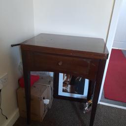 old sewing machine in table ..did work ..needs belt .. please ..collect only ..bargain no offers ..